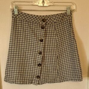Women’s plaid Divided H&M button front mini skirt.